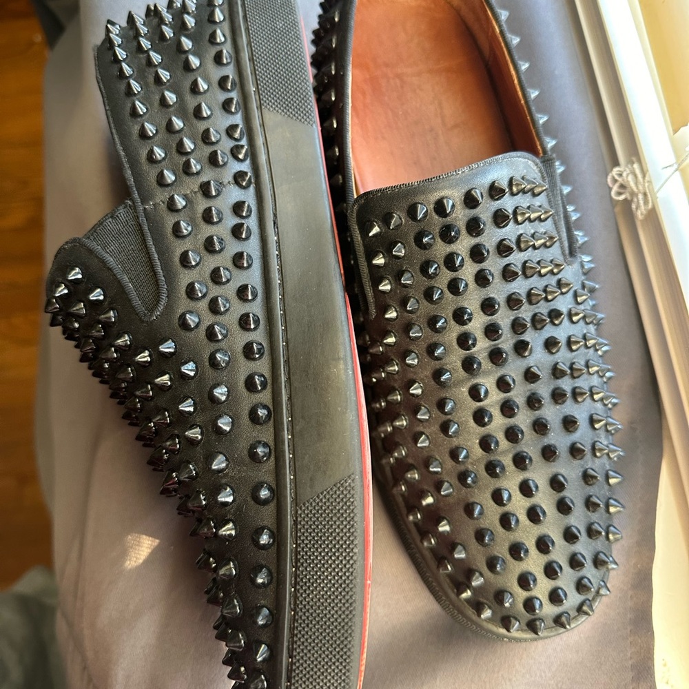 Louboutins men’s black studded loafers. Pre worn, without box. Size 8 mens US